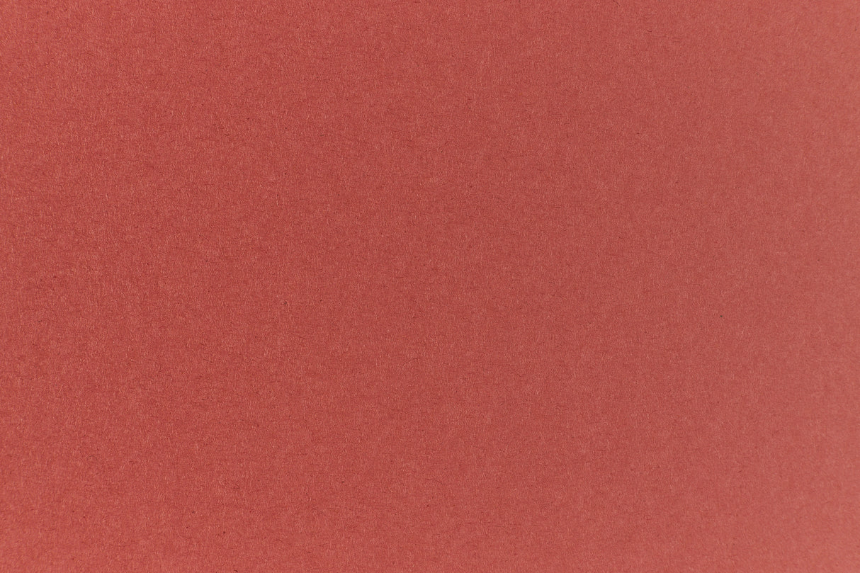 Brick red colored paper sample.