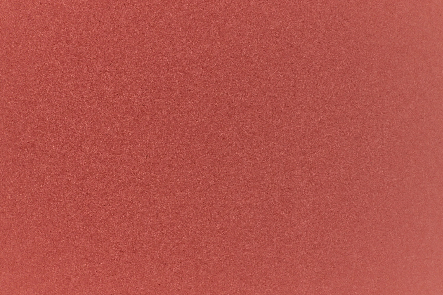 Brick red colored paper sample.