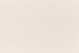 A soft, light pink construction-style cardstock paper viewed closeup.