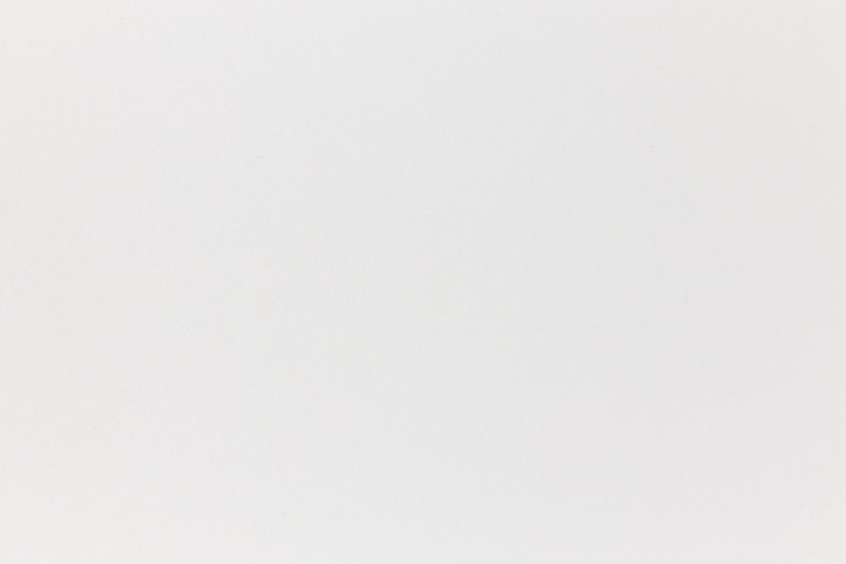 Close up view of white construction paper.