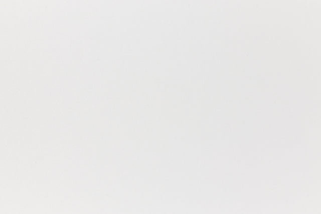 Close up view of white construction paper.