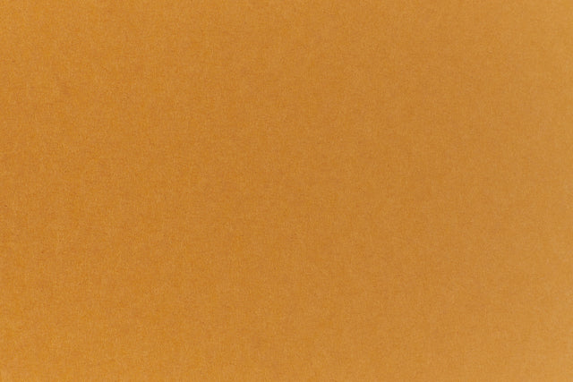 Deep orange cardstock paper for crafting.