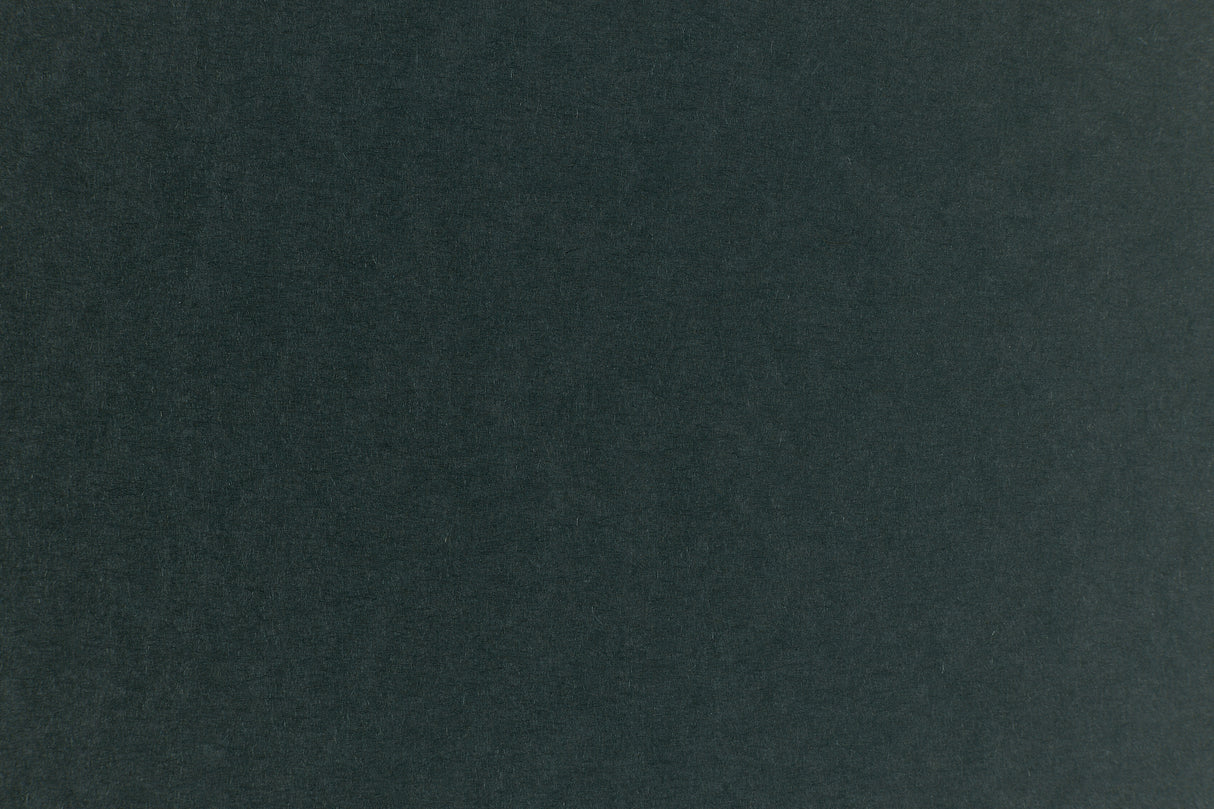 Dark green construction-style cardstock paper in close detail.