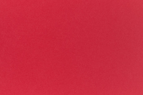 Light red cardstock crafting paper.