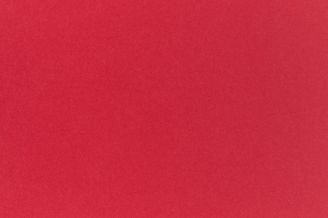 Light red cardstock crafting paper.