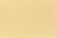 A subdued gold color paper viewed closeup.