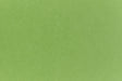 Neon green crafting paper viewed in close detail.
