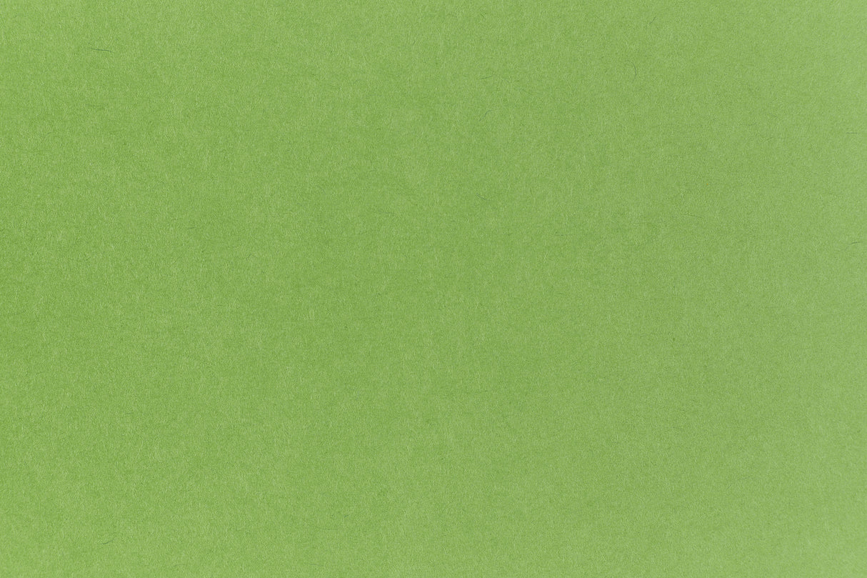 Neon green crafting paper viewed in close detail.