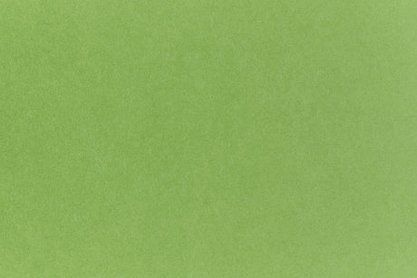 Neon green crafting paper viewed in close detail.