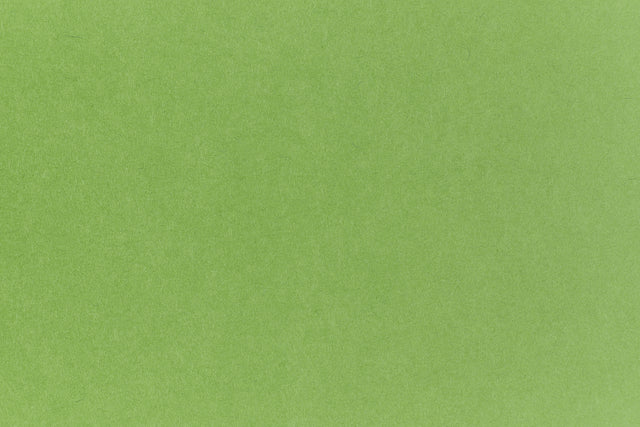 Neon green crafting paper viewed in close detail.