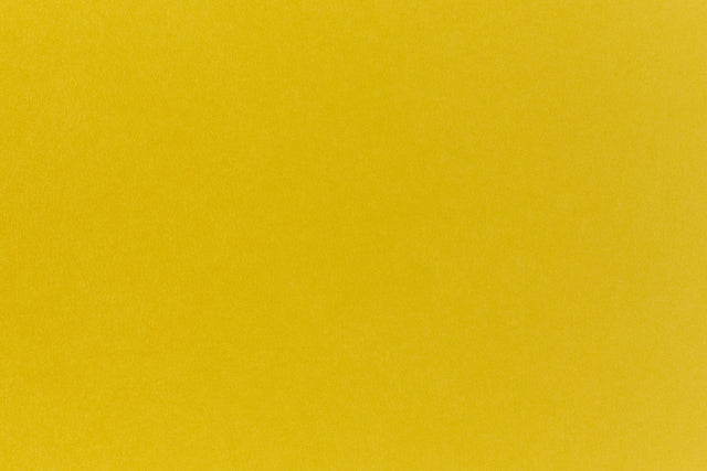 Light yellow cardstock paper.