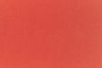Bright orange crafting paper.