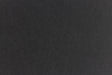 Subtly textured black paper viewed close up.