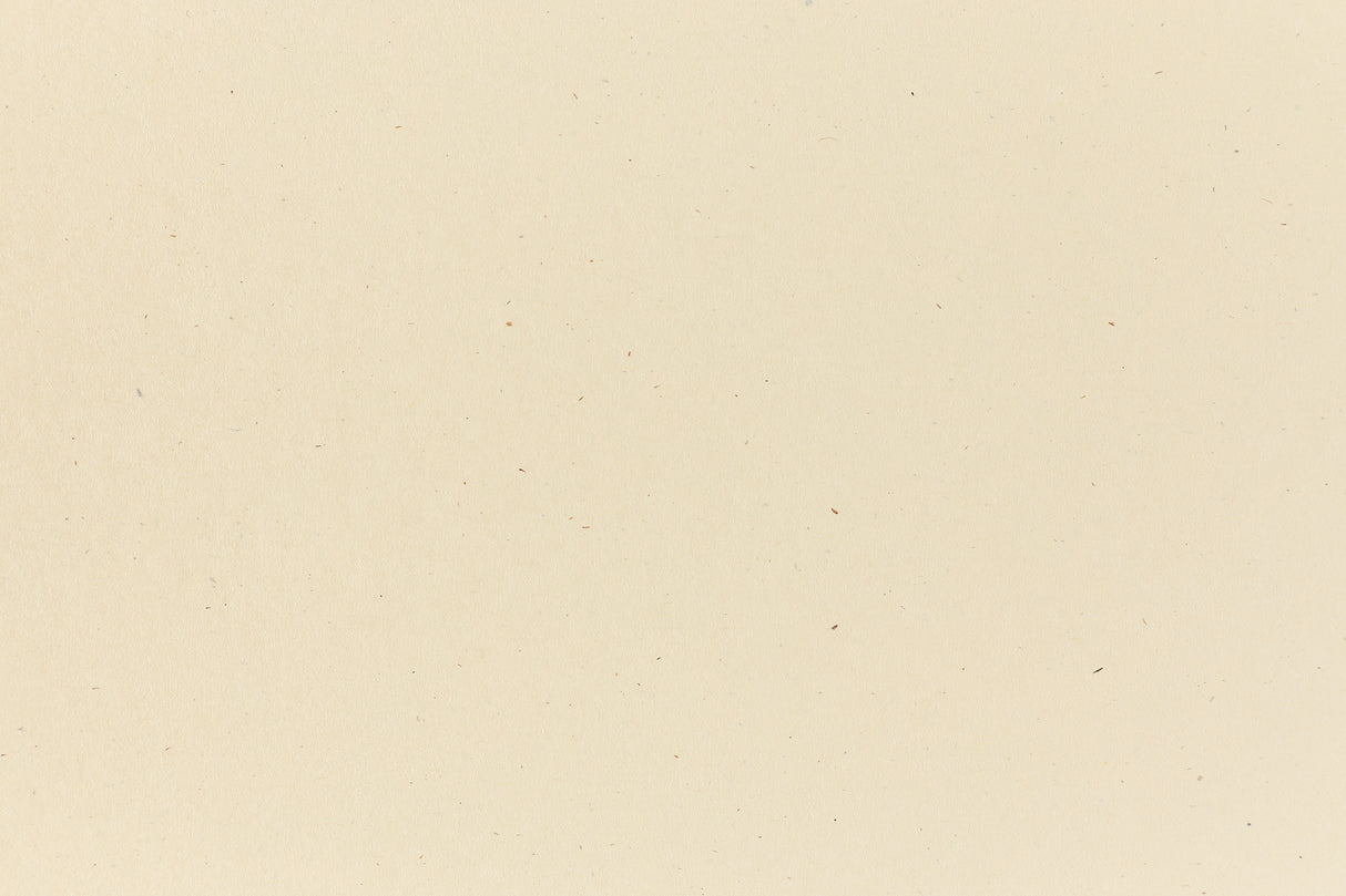 Off-white crafting paper in close detail.