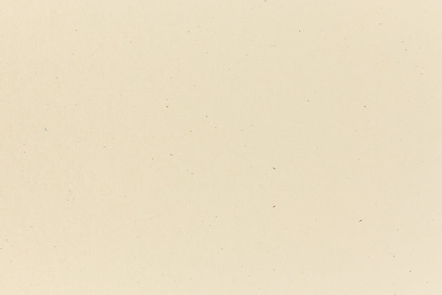 Off-white crafting paper in close detail.
