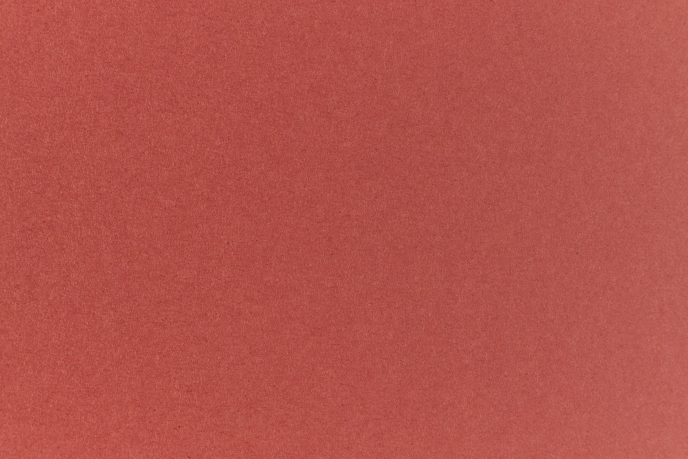 Brick red colored paper sample.