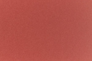 Brick red colored paper sample.