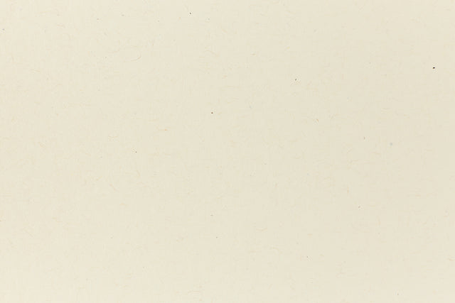 Off-white arts and craft paper. 