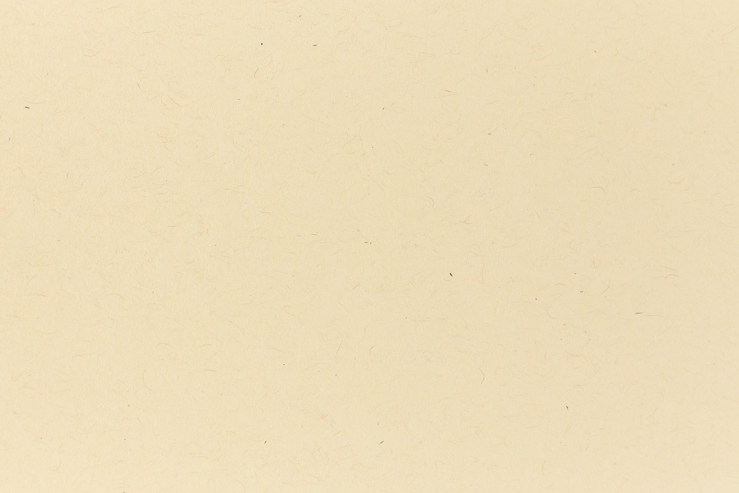 Deep yellow crafting paper shown in close detail. 