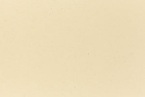 Deep yellow crafting paper shown in close detail. 