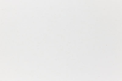 White cardstock paper viewed in close detail. 