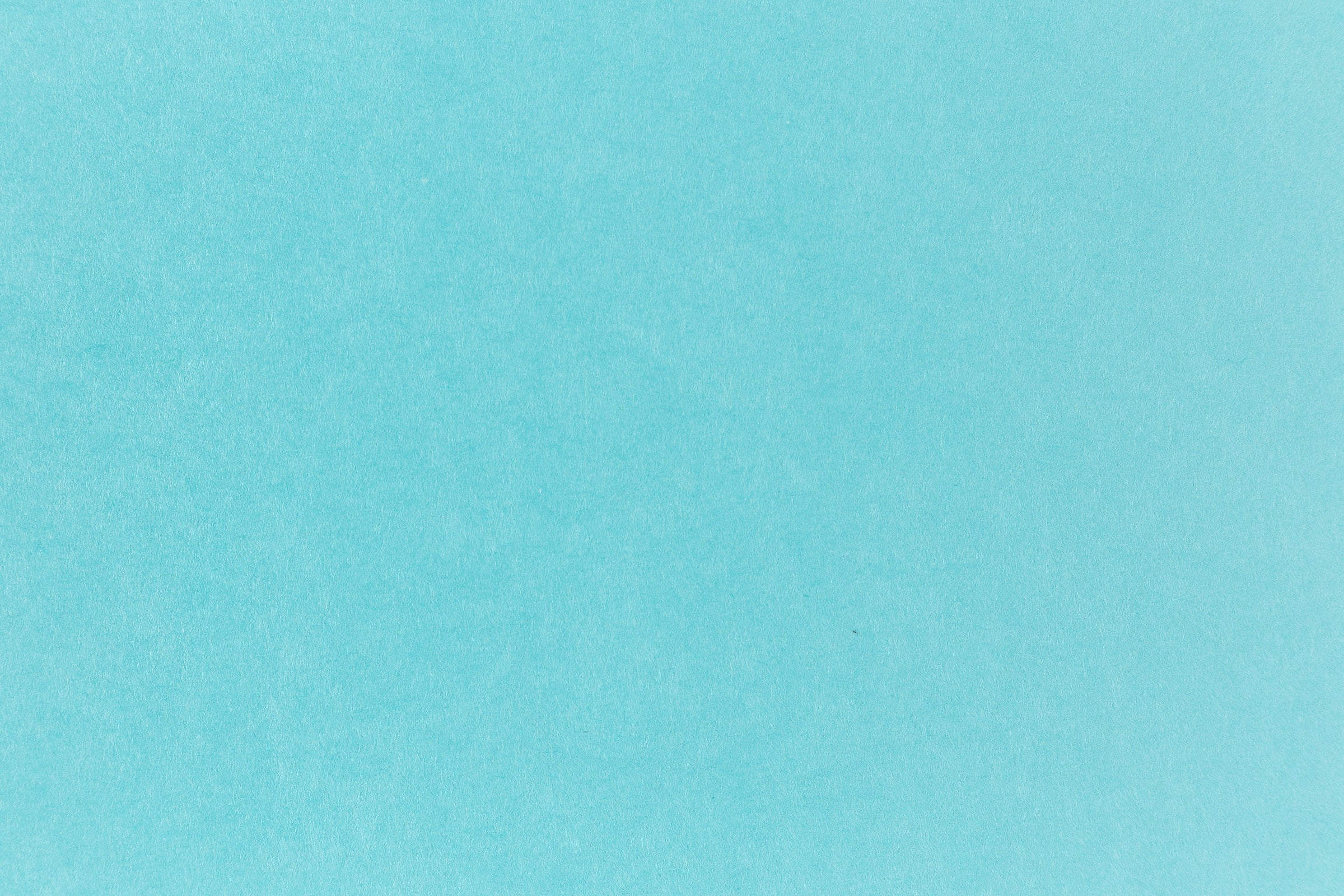 Bright blue paper viewed in detail. 