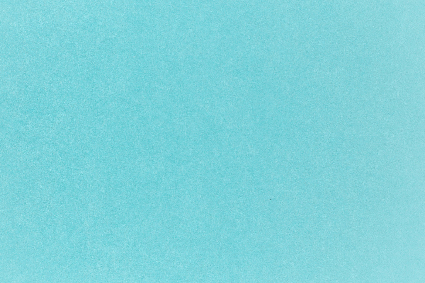 Bright blue paper viewed in detail. 