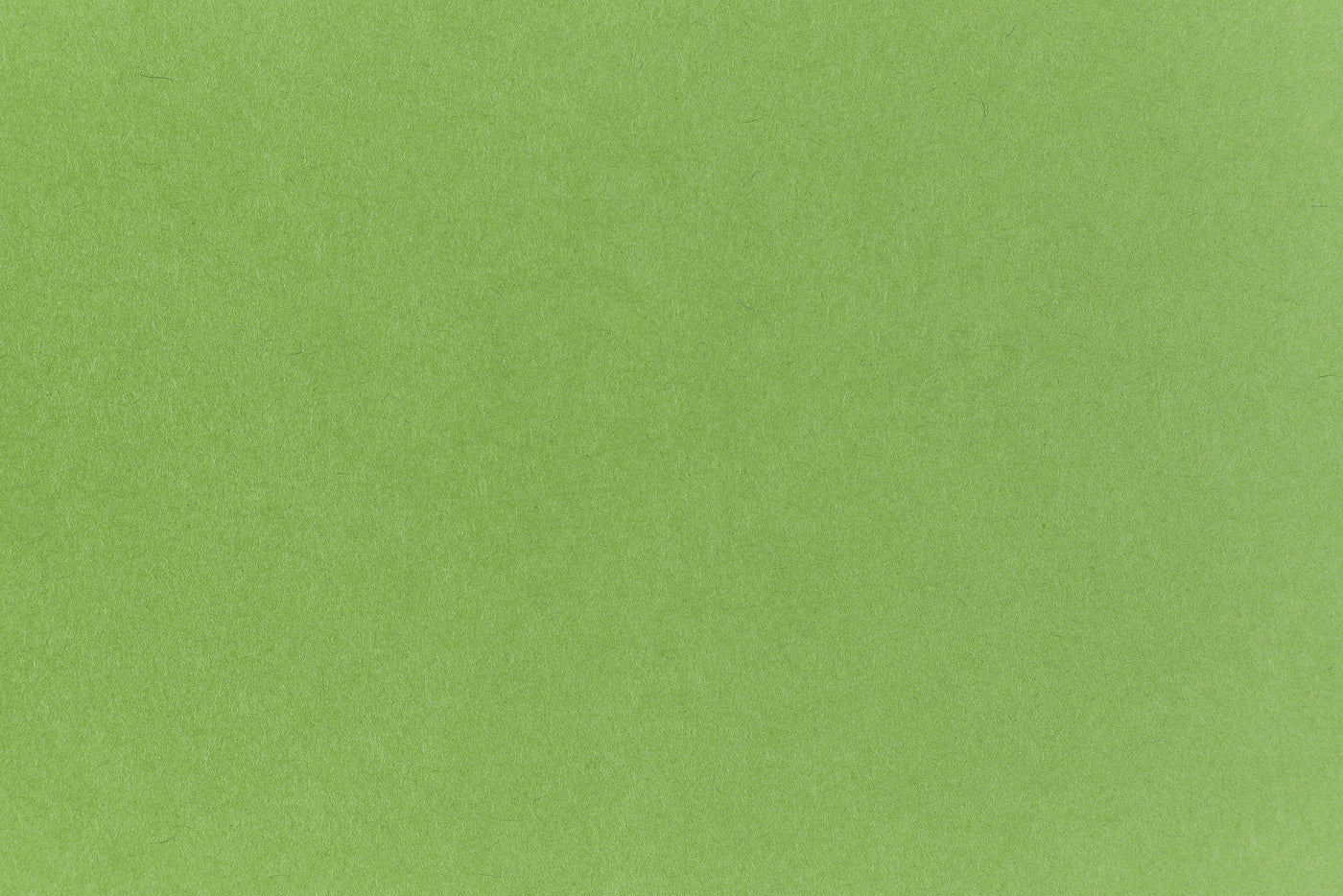 Neon green crafting paper viewed in close detail.