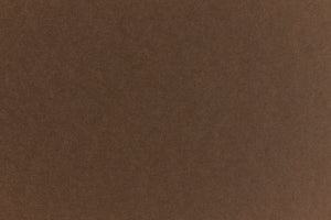Chocolate colored crafting paper viewed in close detail.  