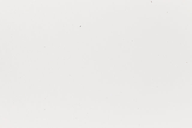 Immaculately white crafting paper viewed in detail. 